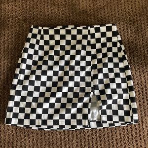 Black and white checkered mini skirt from Stitch & Pine size S